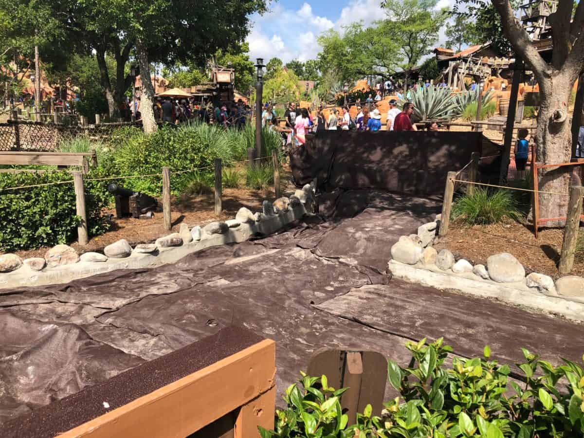 tarps on the ground near old smoking area