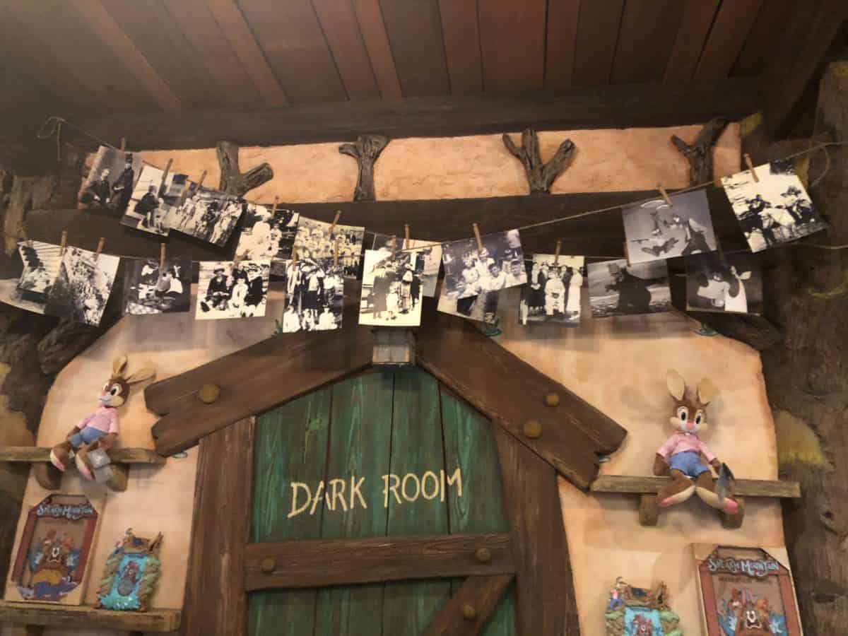 photos hanging as decoration in Splash Mountain gift shop