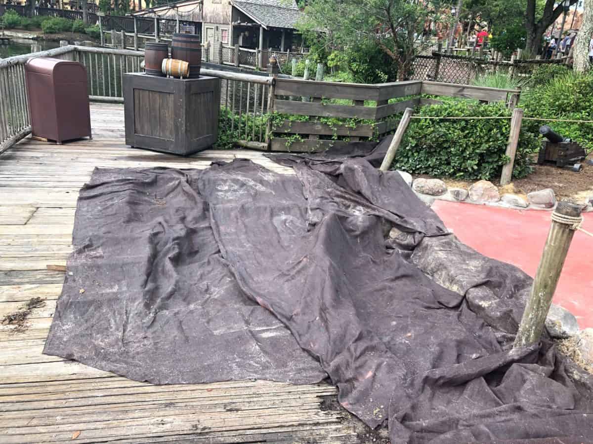 Tarps over the newly done Miner's Cove in Frontierland