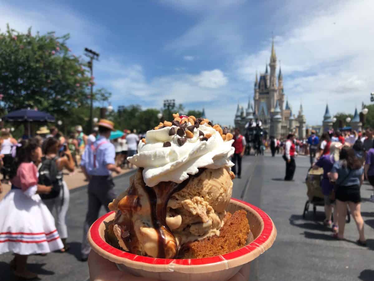 ice cream sundae with cinderella's castle in the background