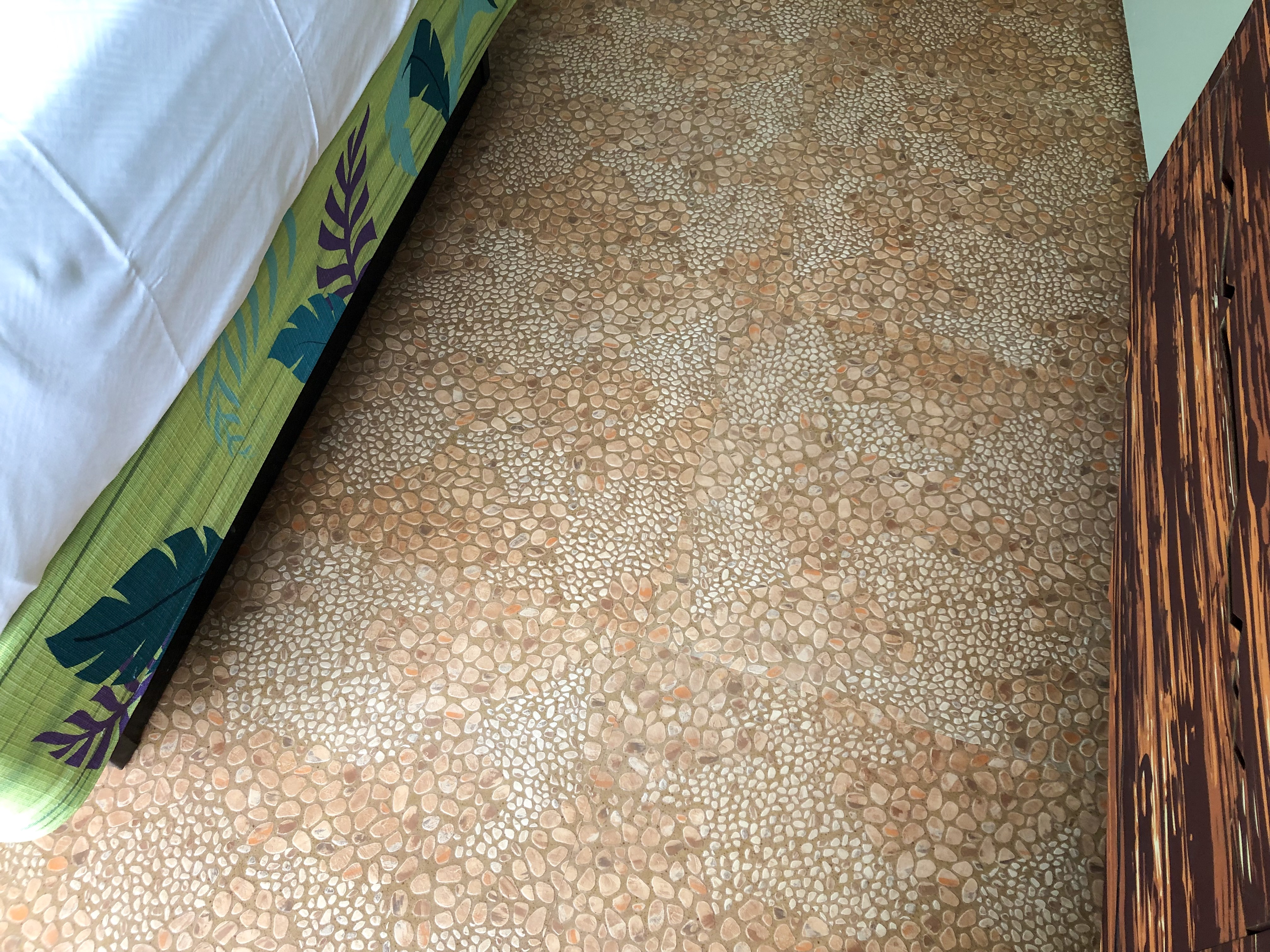 New pebble type of flooring at Art of Animation