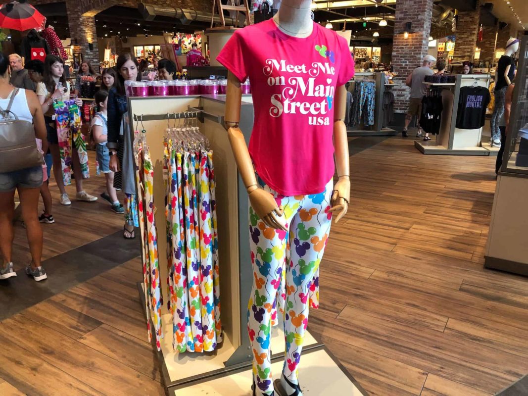 Meet me on Main Street USA Shirt, bright pink with white lettering and Mickey balloons