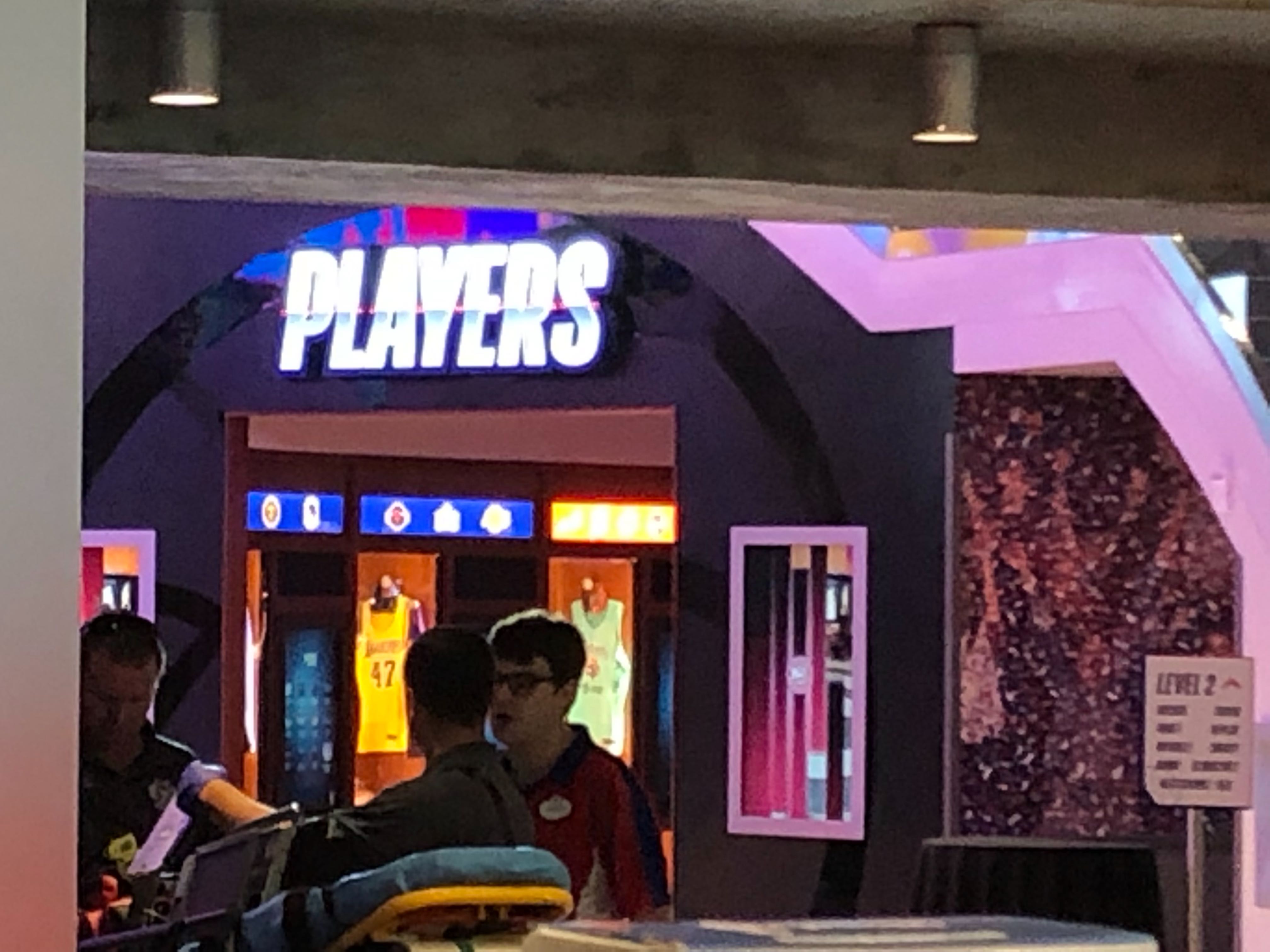 Players light up sign inside NBA Experience