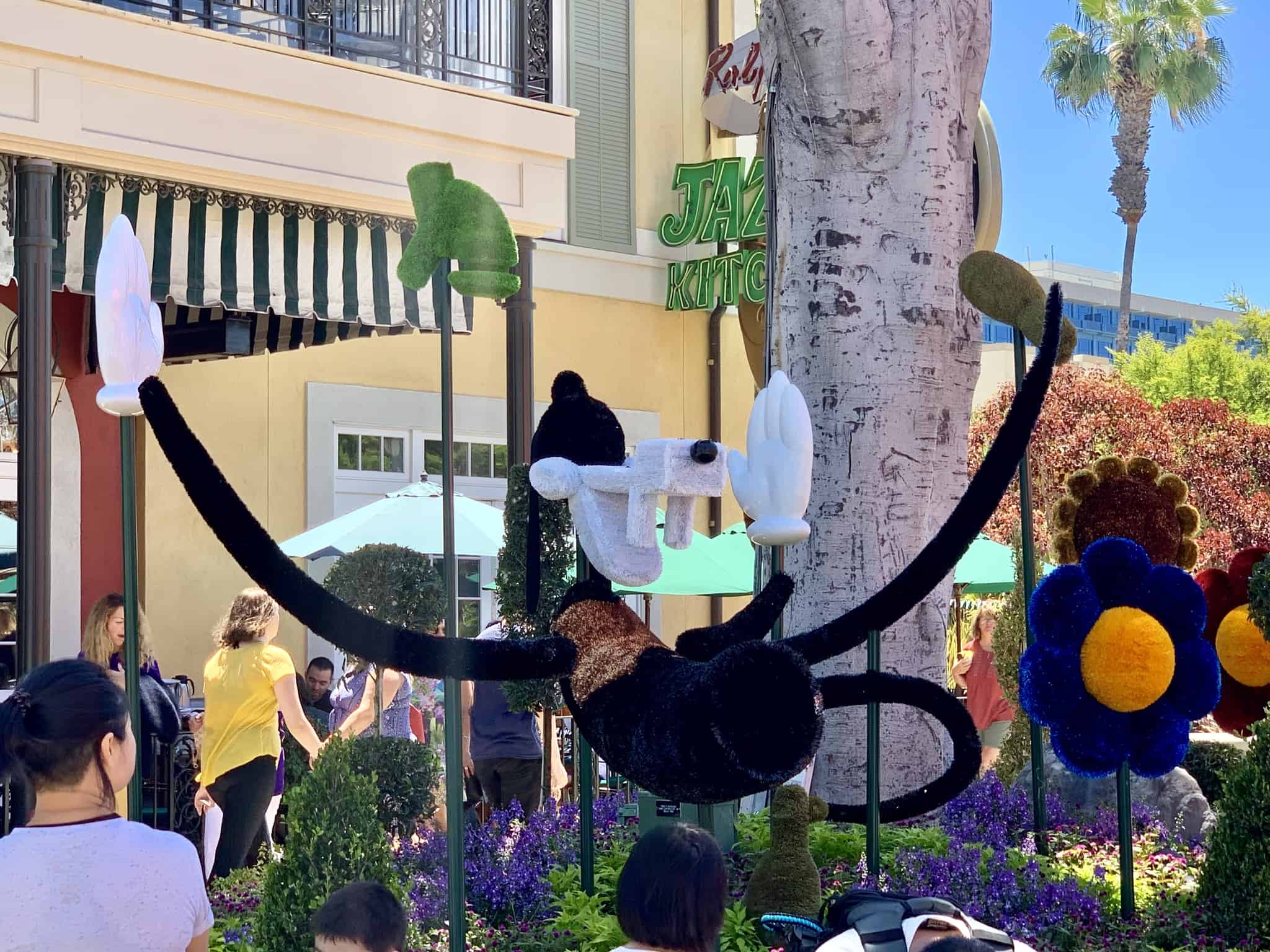 Downtown Disney District July 1 2019 Mickey and Friends Abstract Topiaries, Retro Disney Parks Collage Loungefly, and More