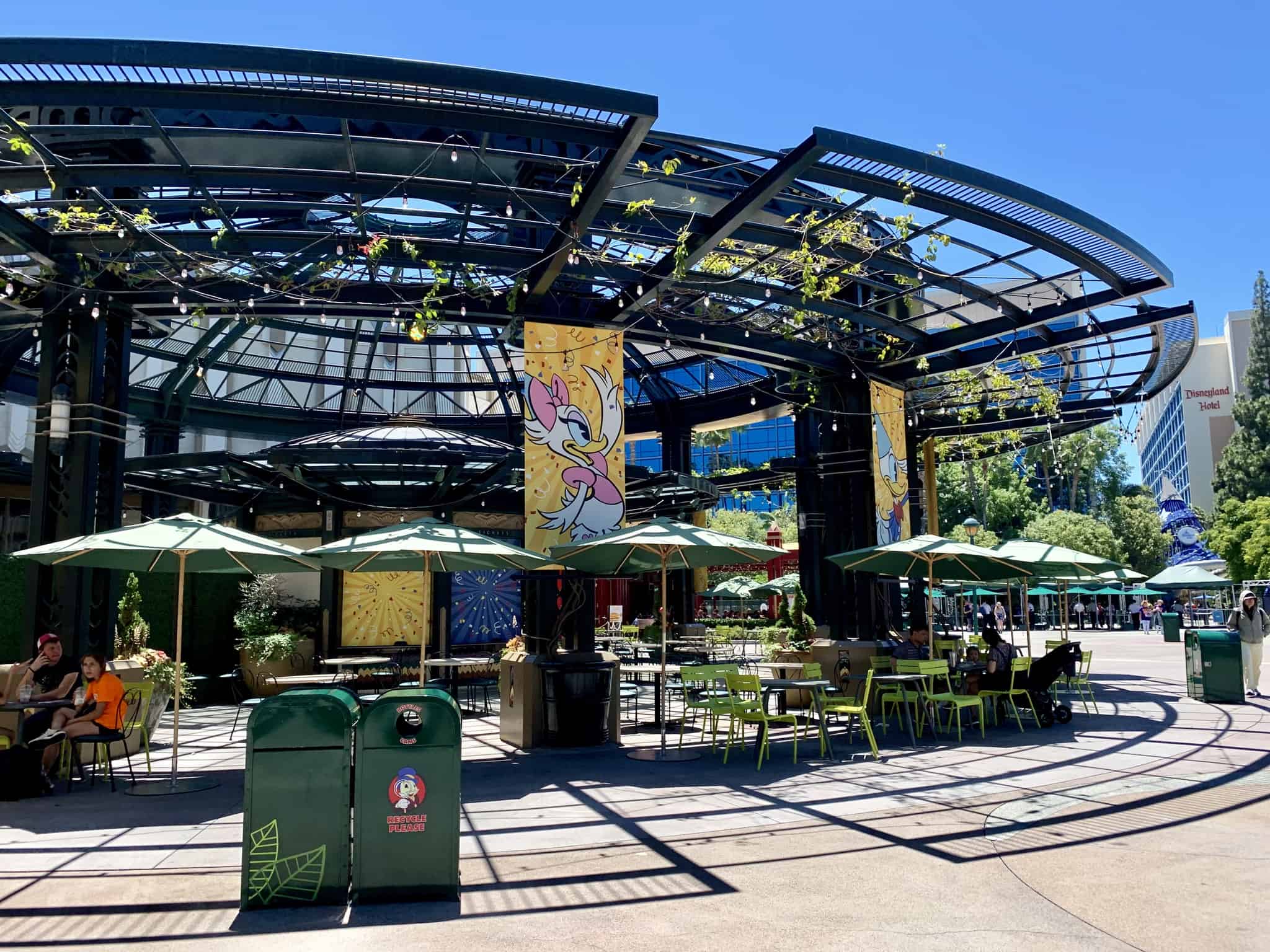 Downtown Disney District July 1 2019 Mickey and Friends Abstract Topiaries, Retro Disney Parks Collage Loungefly, and More
