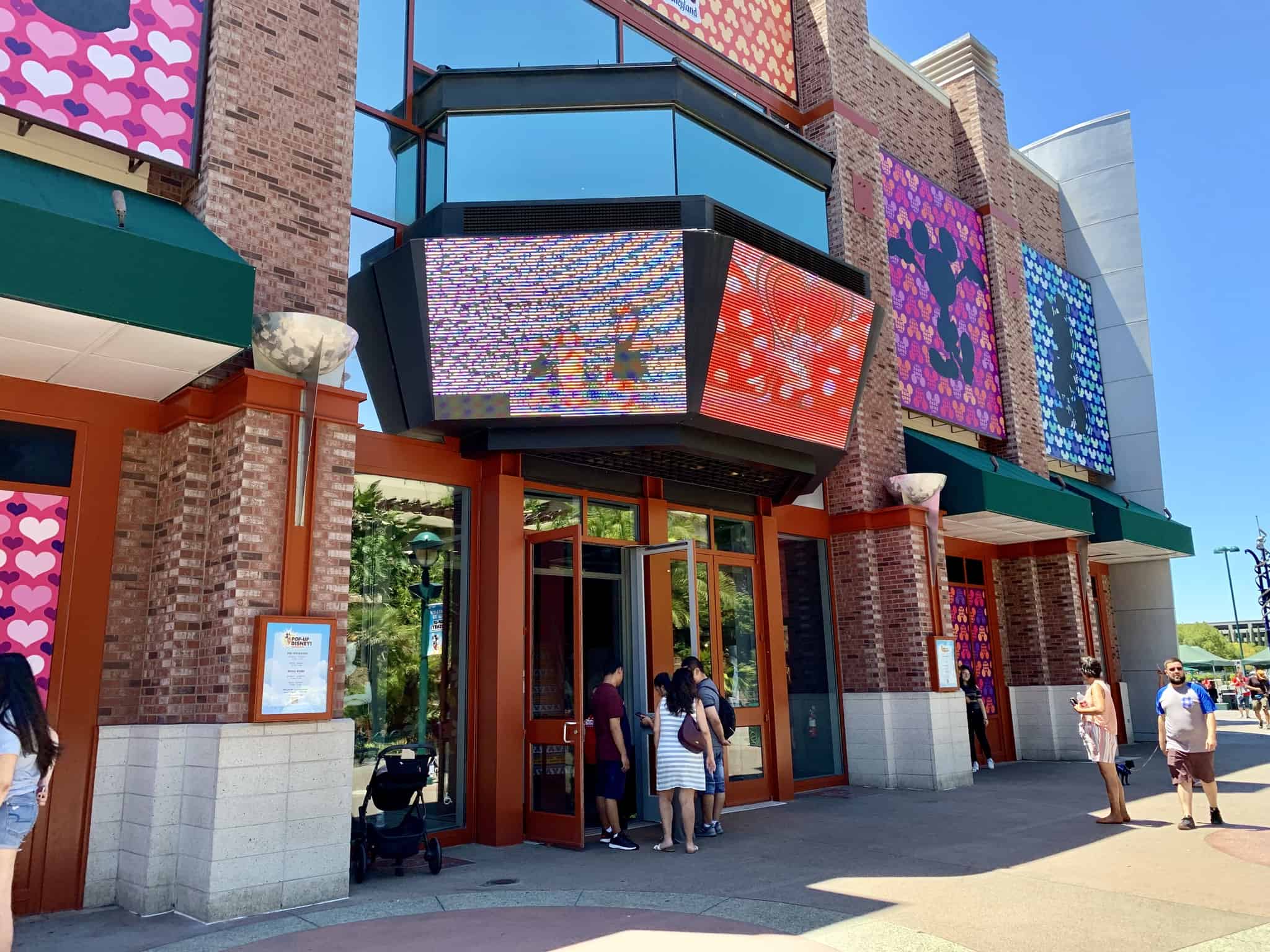 Downtown Disney District July 1 2019 Mickey and Friends Abstract Topiaries, Retro Disney Parks Collage Loungefly, and More