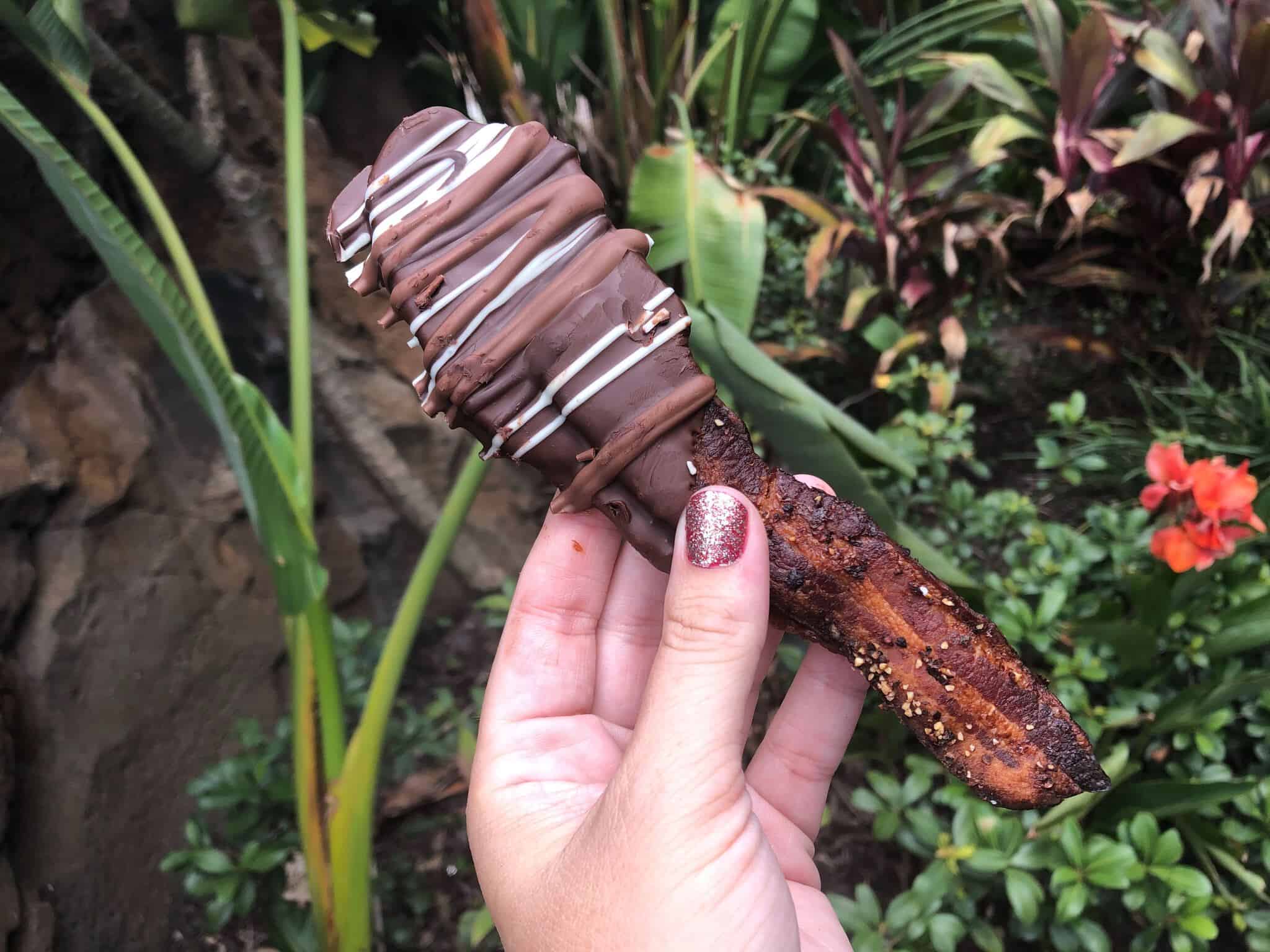 dark chocolate dipped bacon with milk and white chocolate drizzle