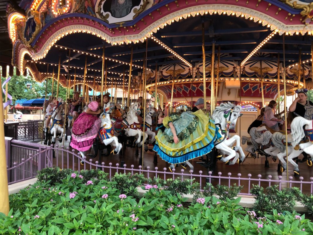 cinderella's step sister riding the carousel