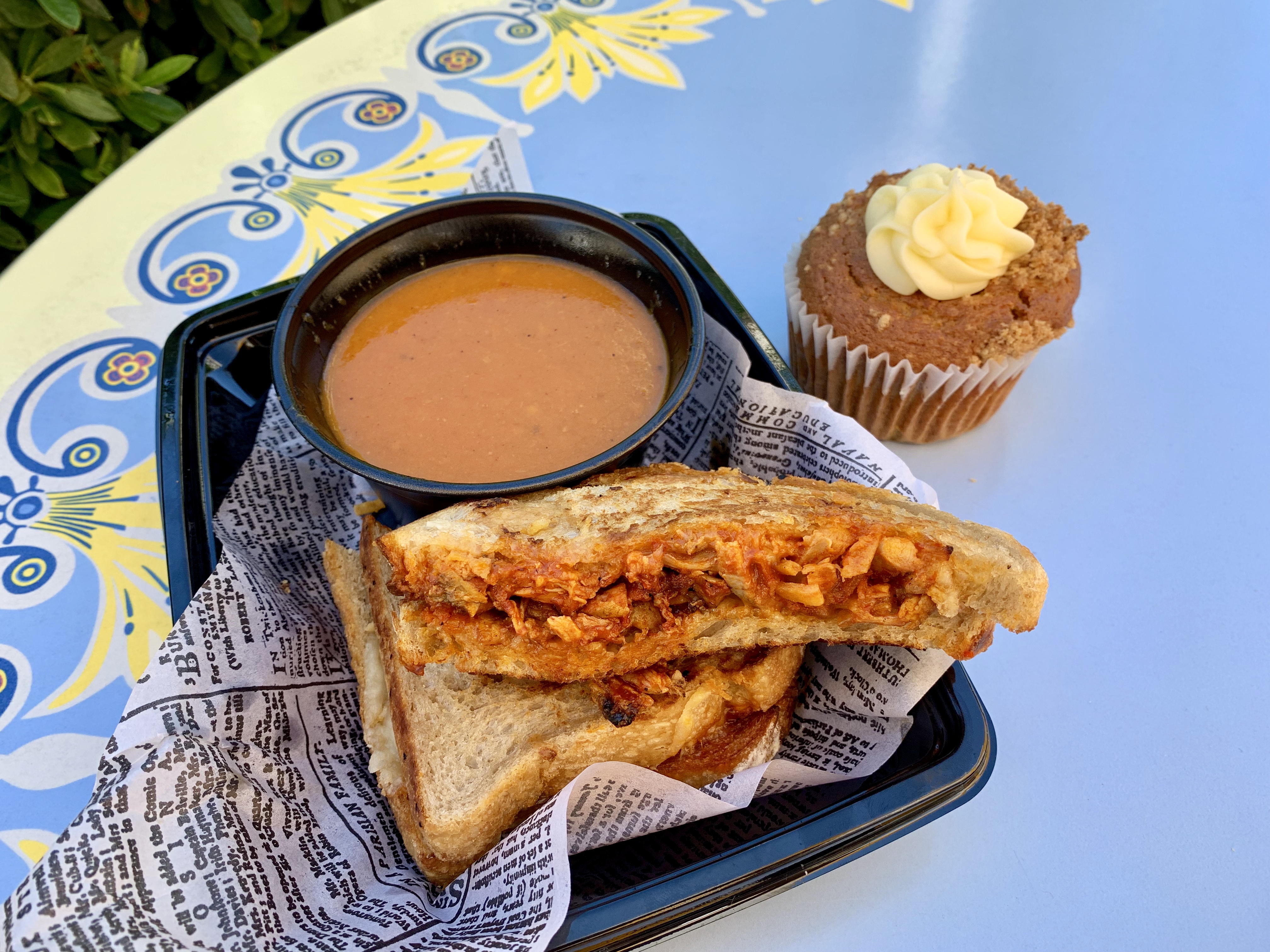 Salsa roja chicken sandwich, tomato soup, and pumpkin muffin