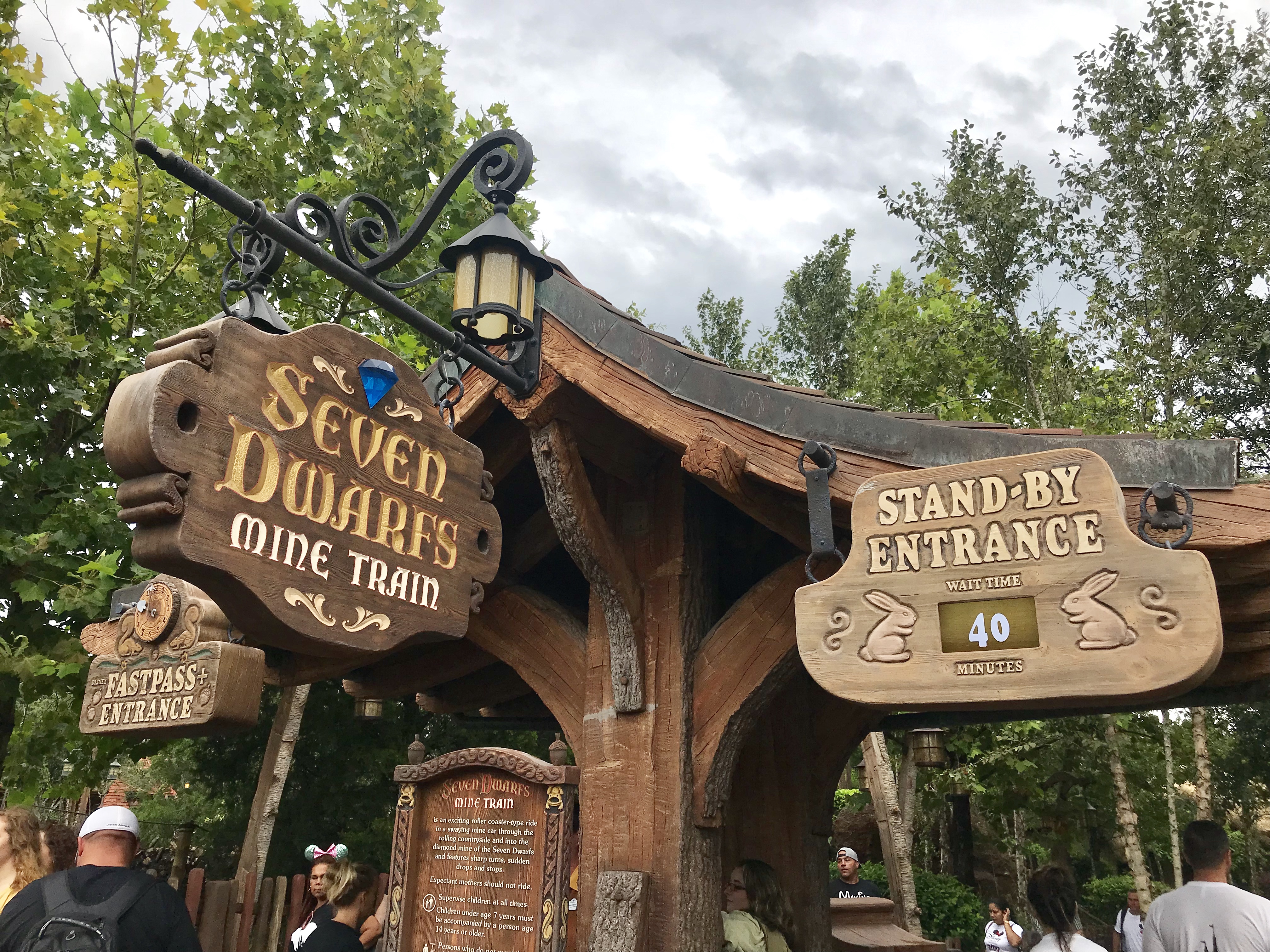 Seven Dwarfs Mine Train sign and stand-by entrance wait time sign