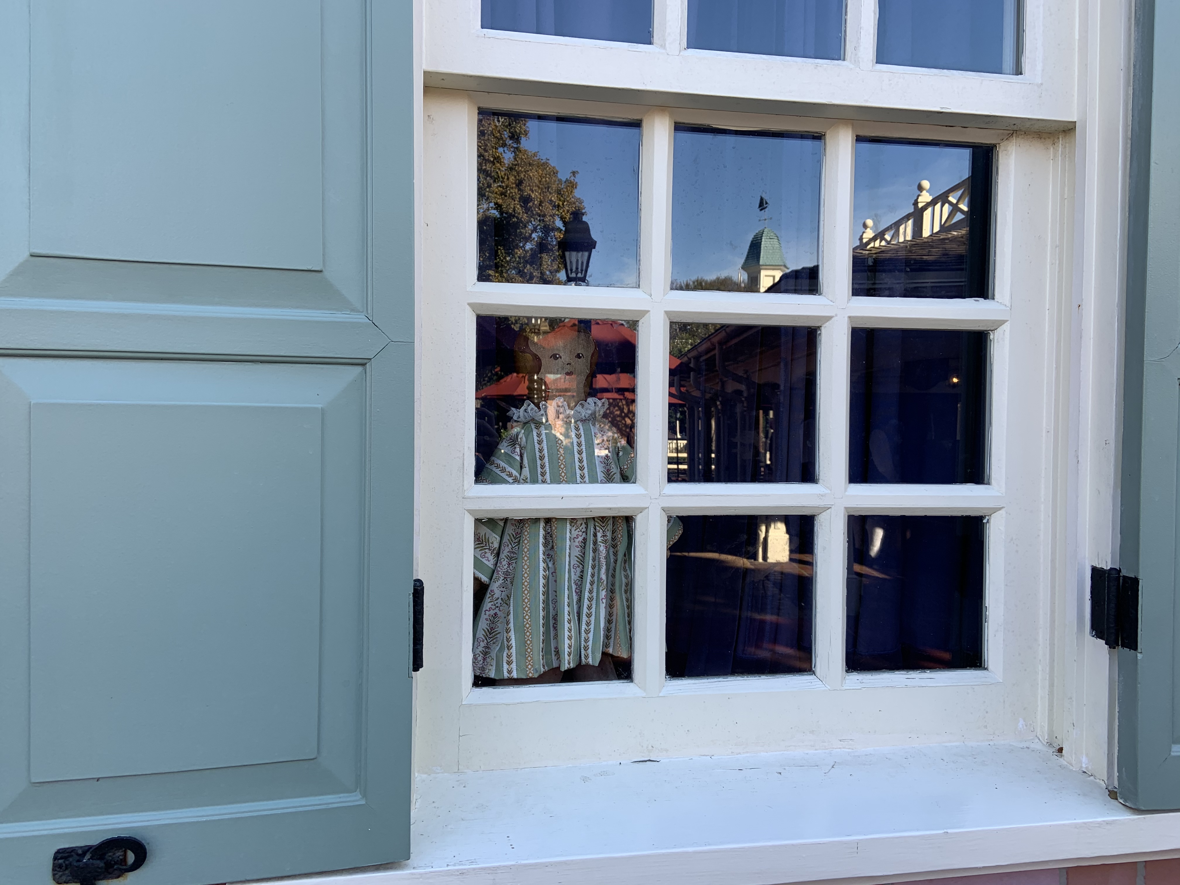 Creepy doll Liberty Square Marketplace 1