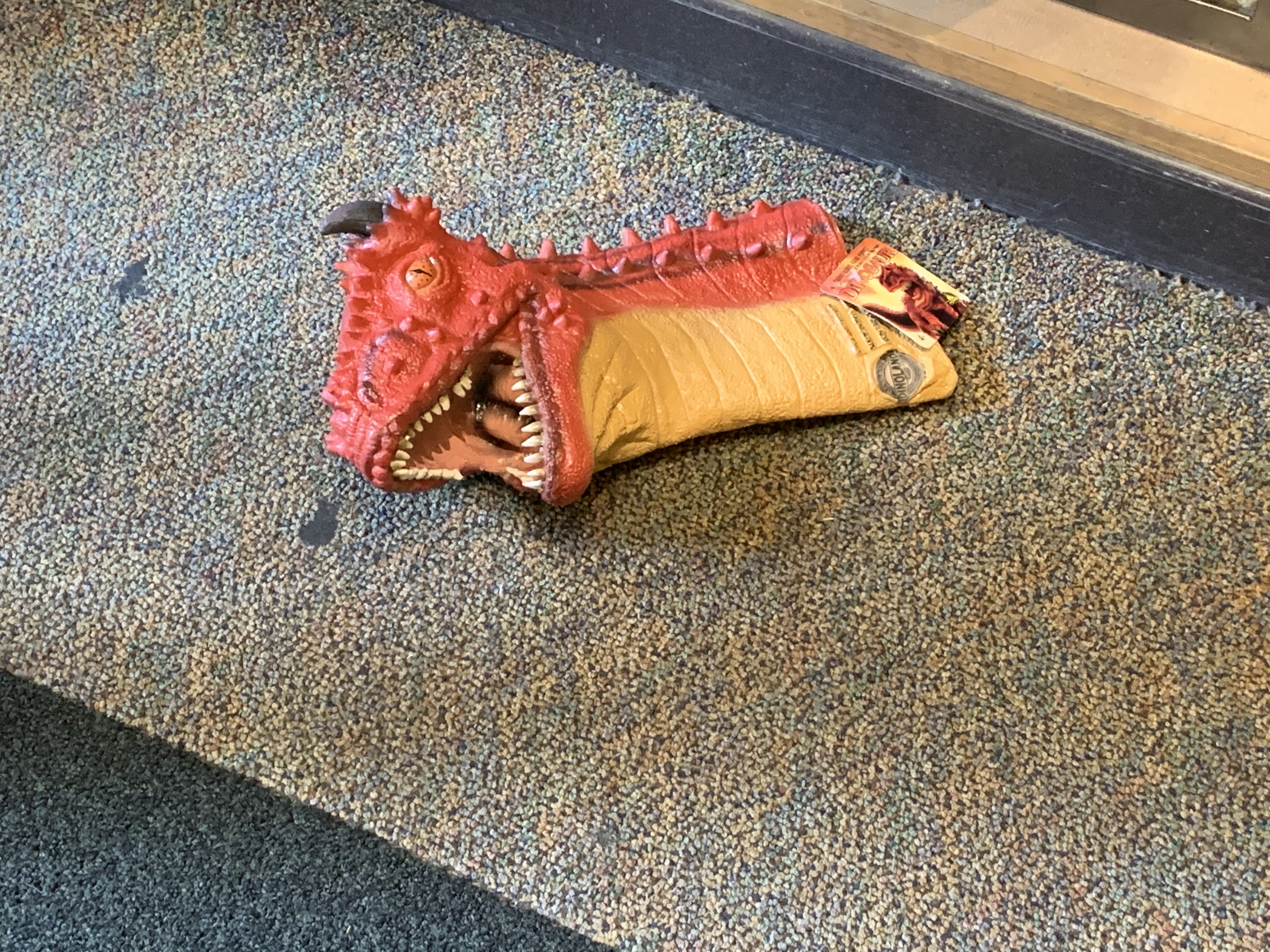 Dino puppet on the ground