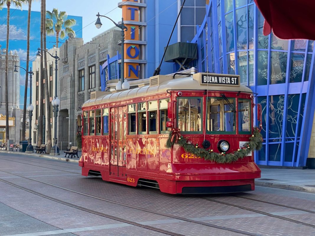 featured Buena Vista Street trolley with Christmas garland