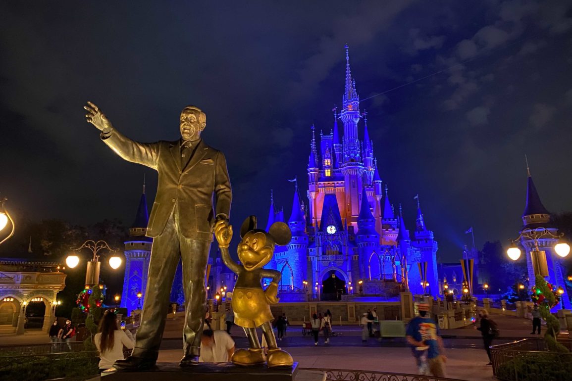 Partners Statue and Cinderella Castle at night