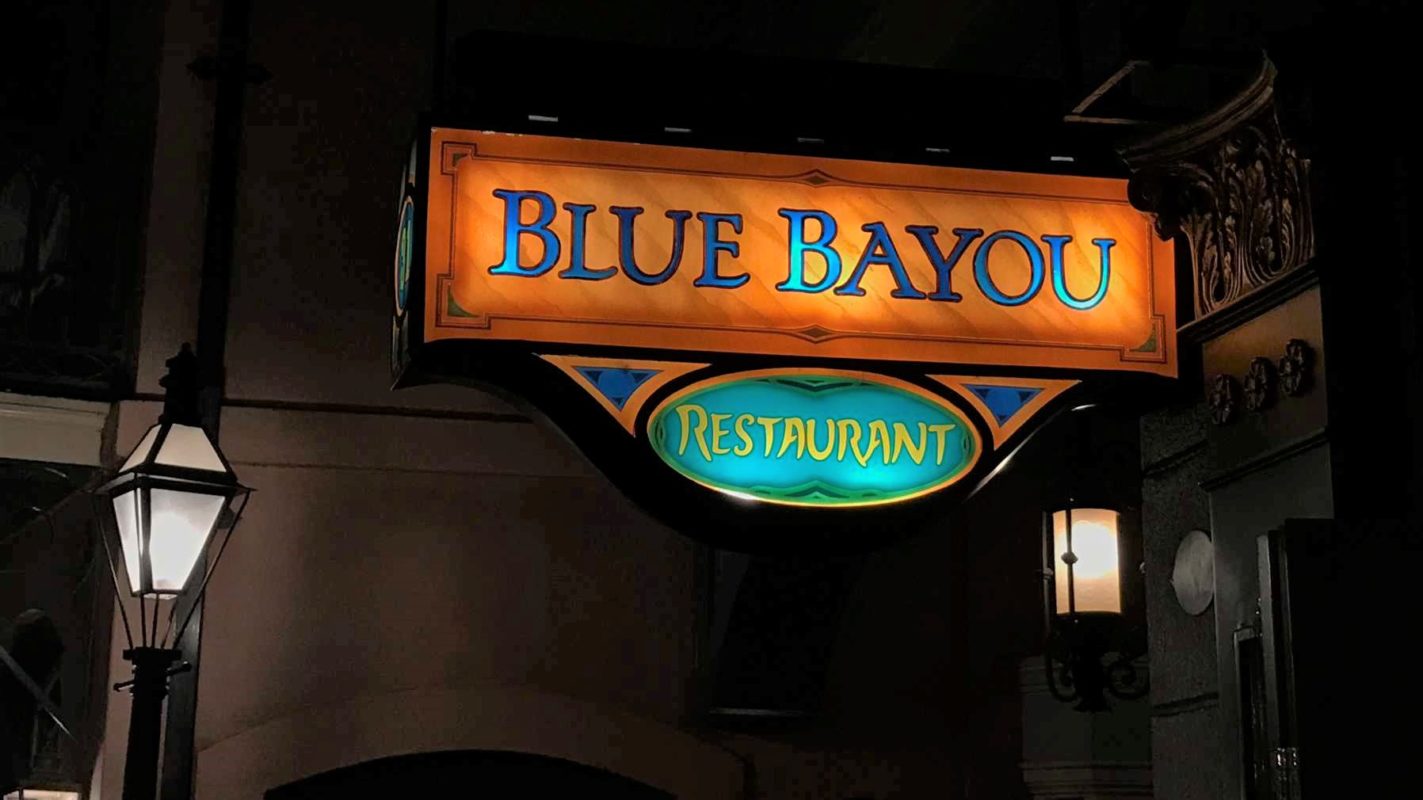 Blue Bayou Restaurant sign illuminated at night