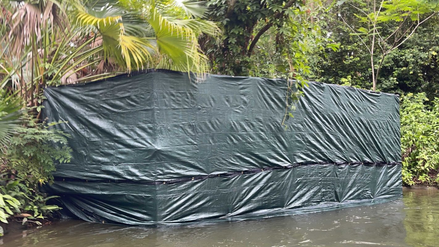 A giant box covered in tarp is hiding a new scene in the Jungle Cruise at Magic Kingdom in Walt Disney World