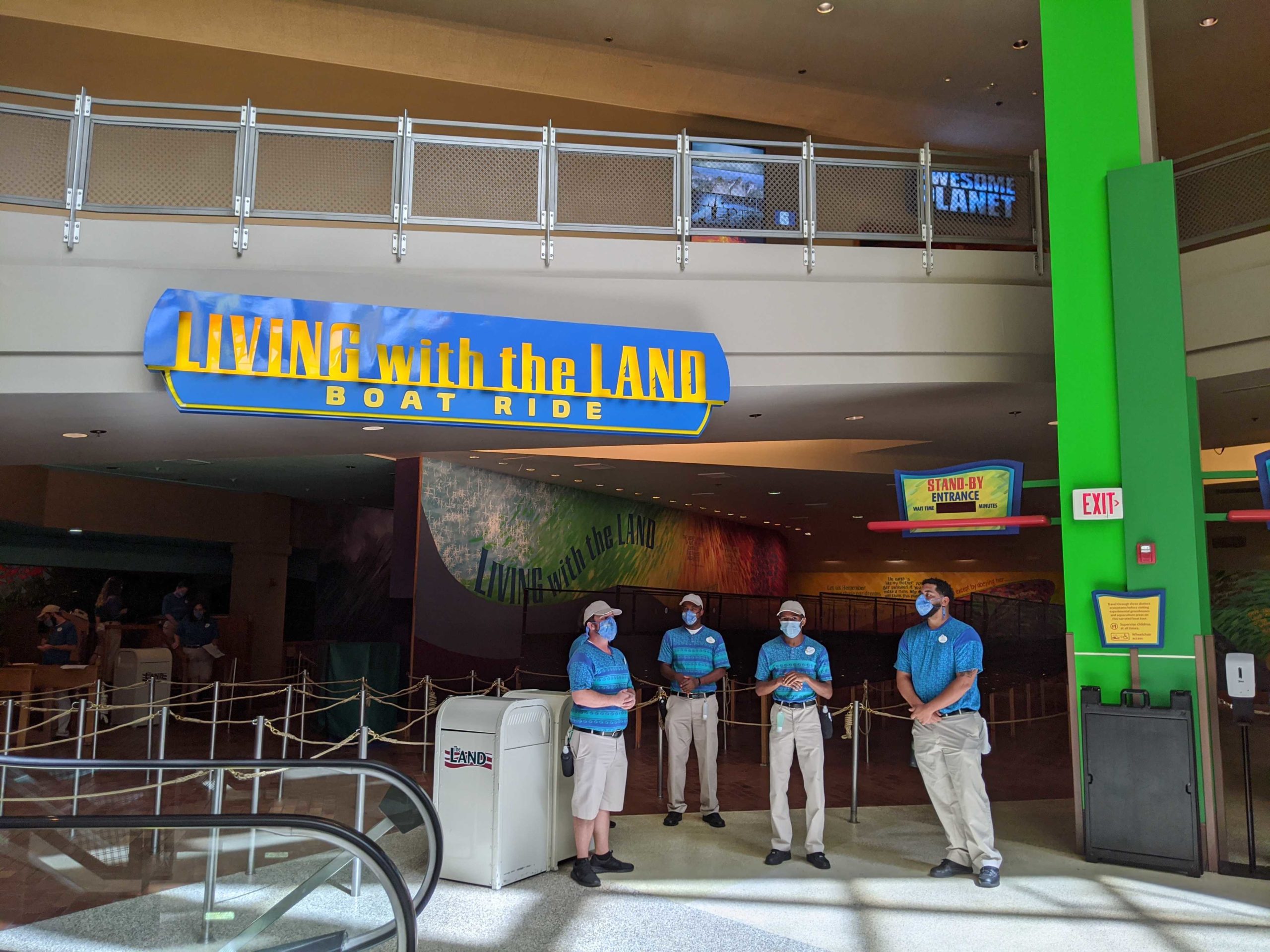 living-with-the-land-sign-cast-3179396