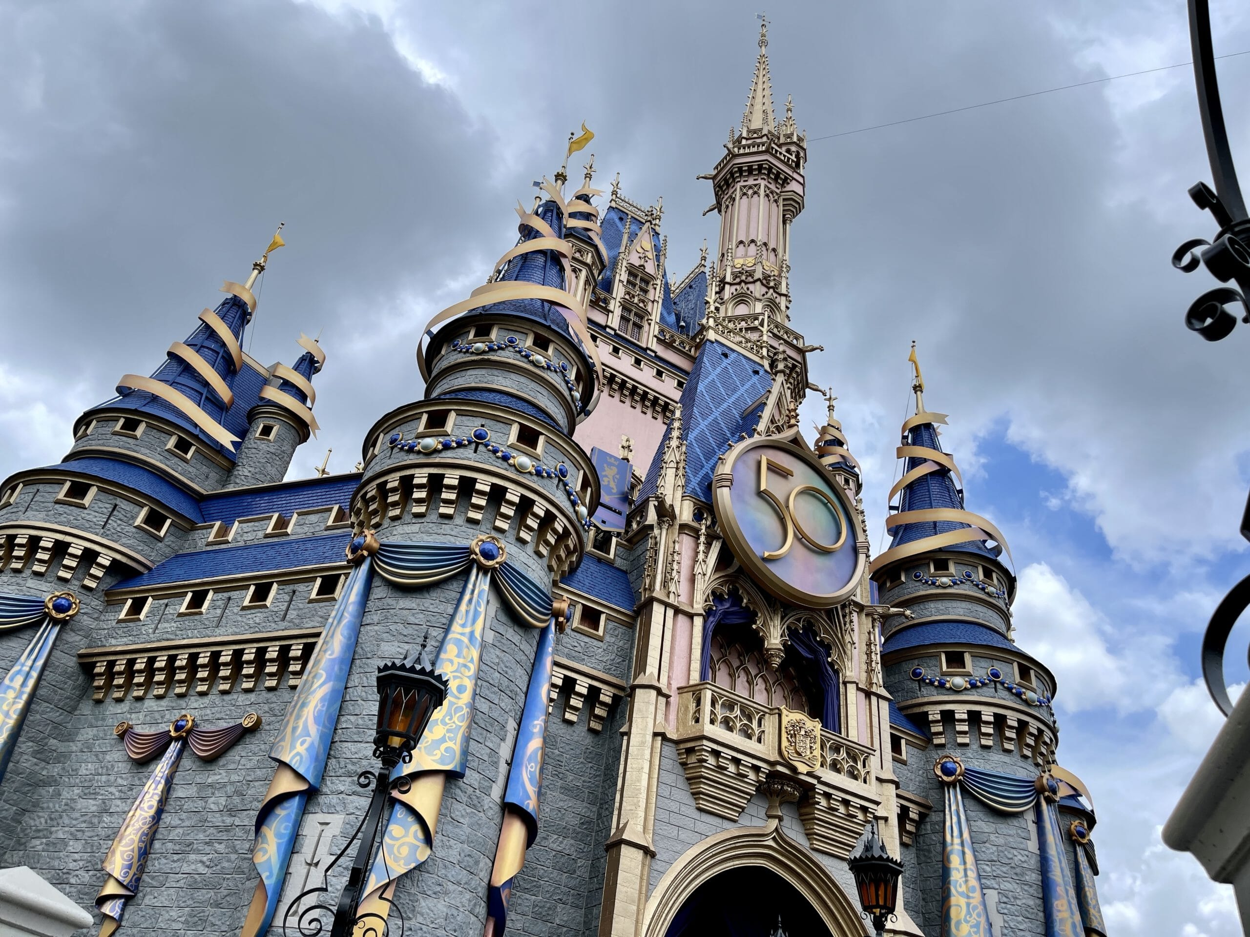 cinderella-castle-50th-anniversary-medallion-featured-image-hero-magic-kingdom-07282021-9825542-scaled-7215770