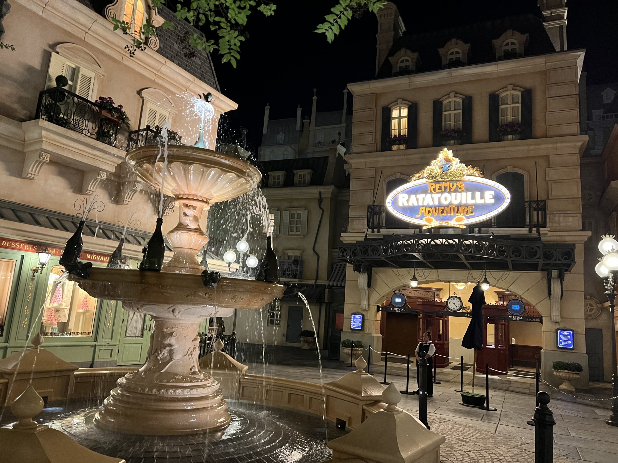 remy's ratatouille adventure fountain at night