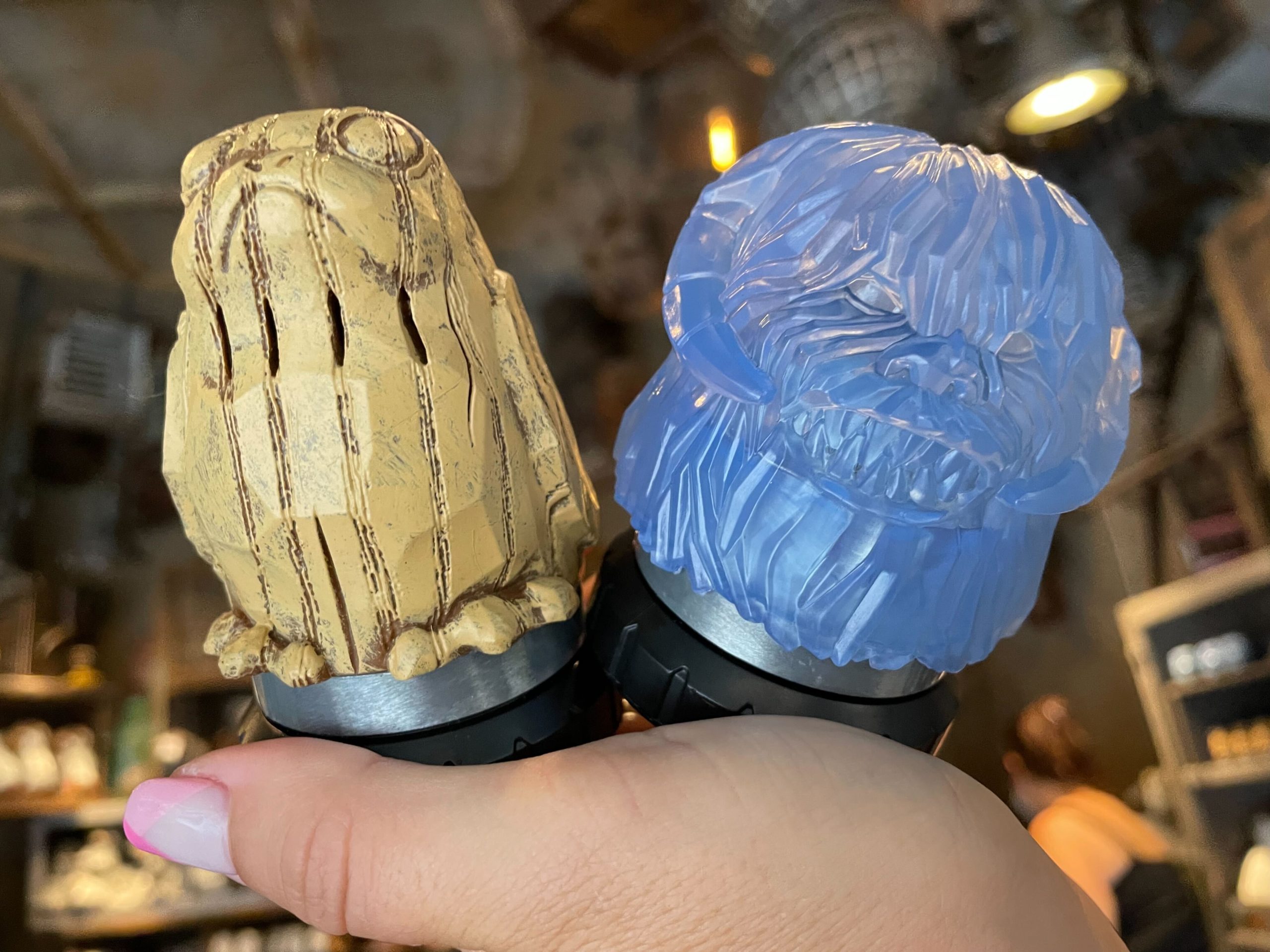 Wampa and Porg lightsaber hilt caps