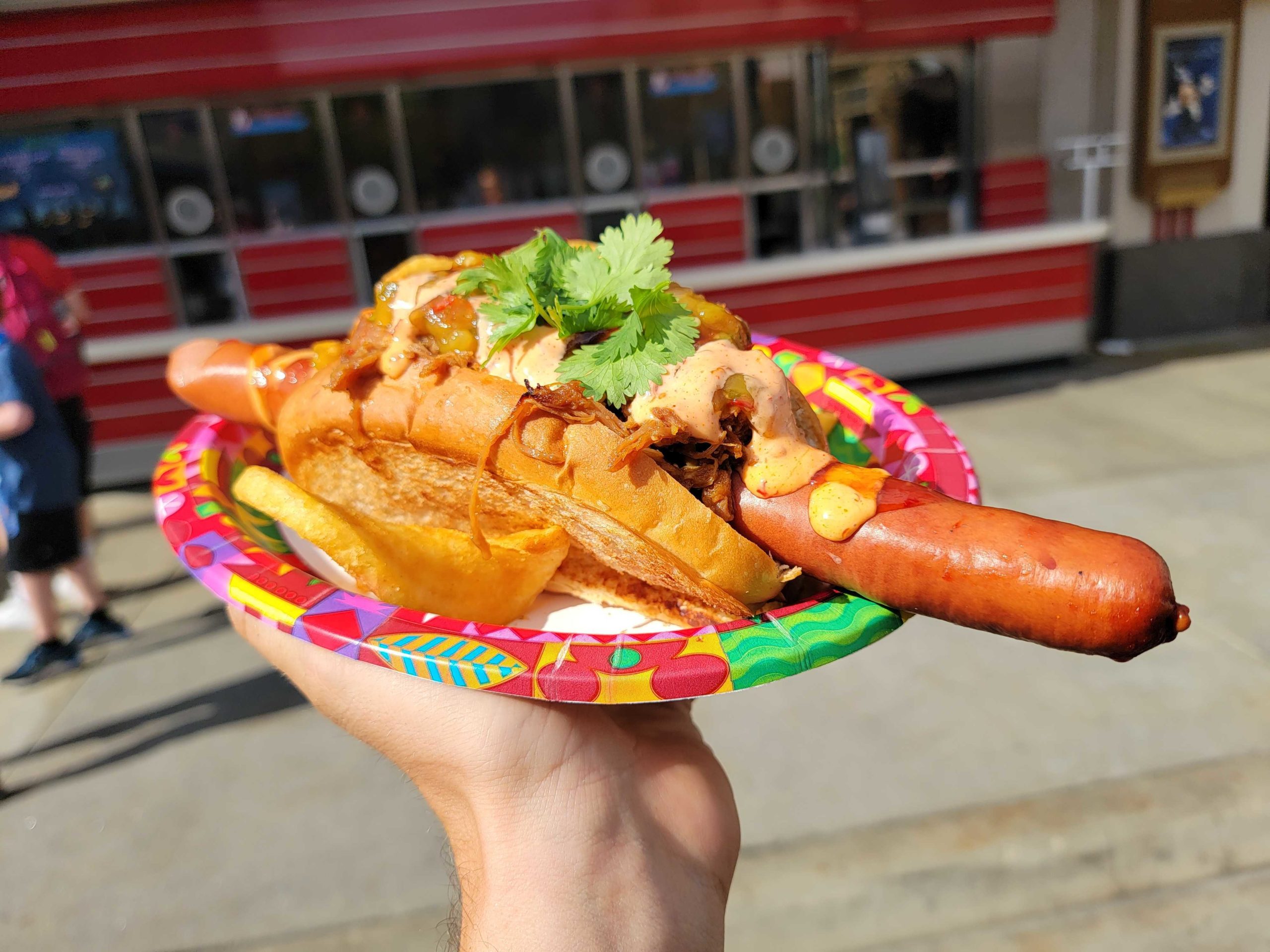 Foot-long spicy pulled pork dog