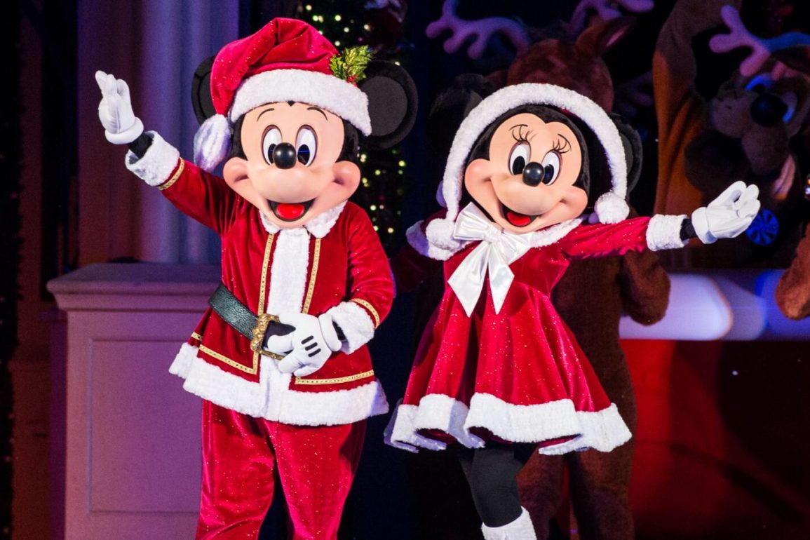 Mickey and Minnie in Santa outfits, Mickey’s Most Merriest Celebration
