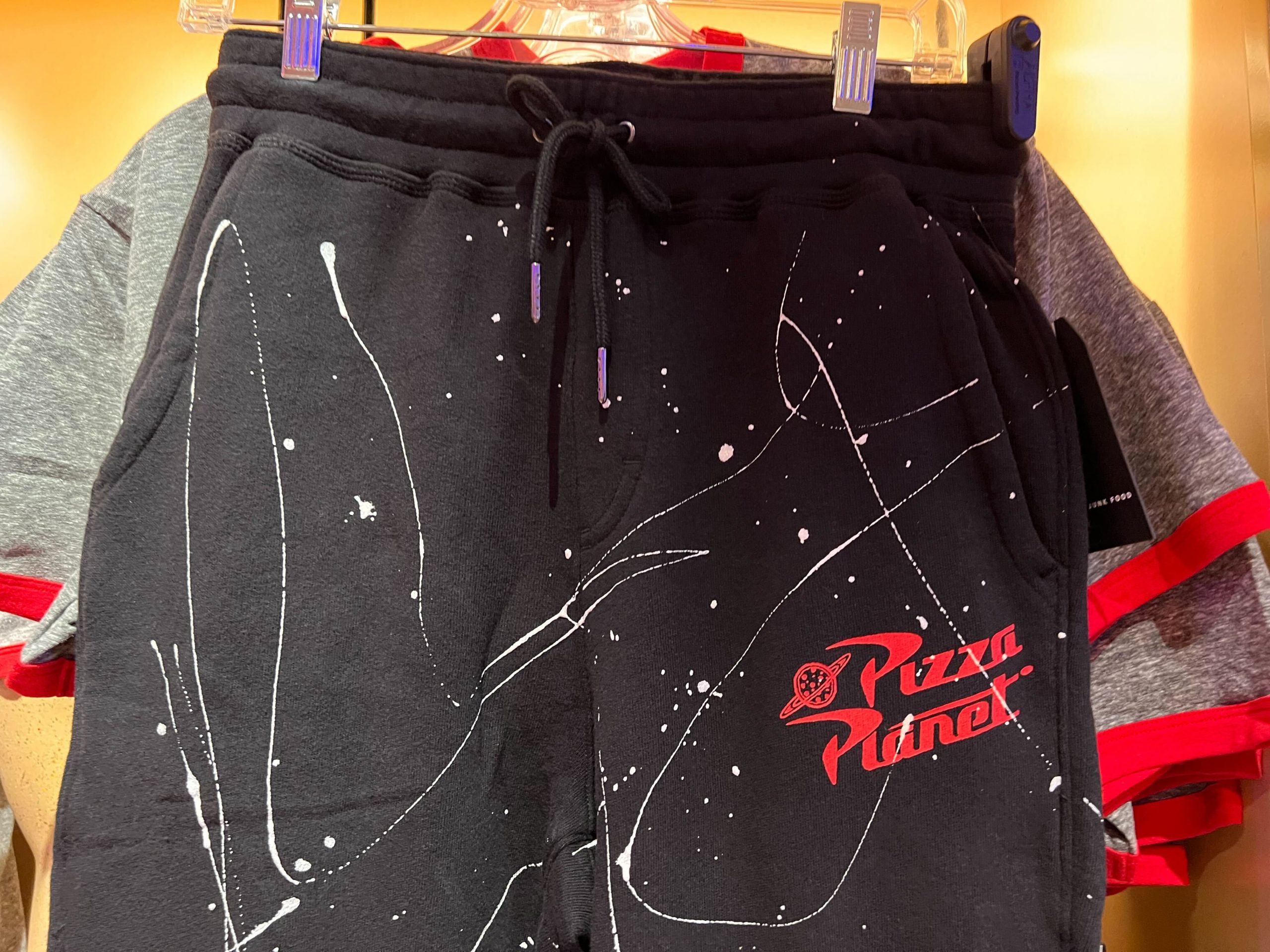 Pizza planet sweatpants joggers close up front