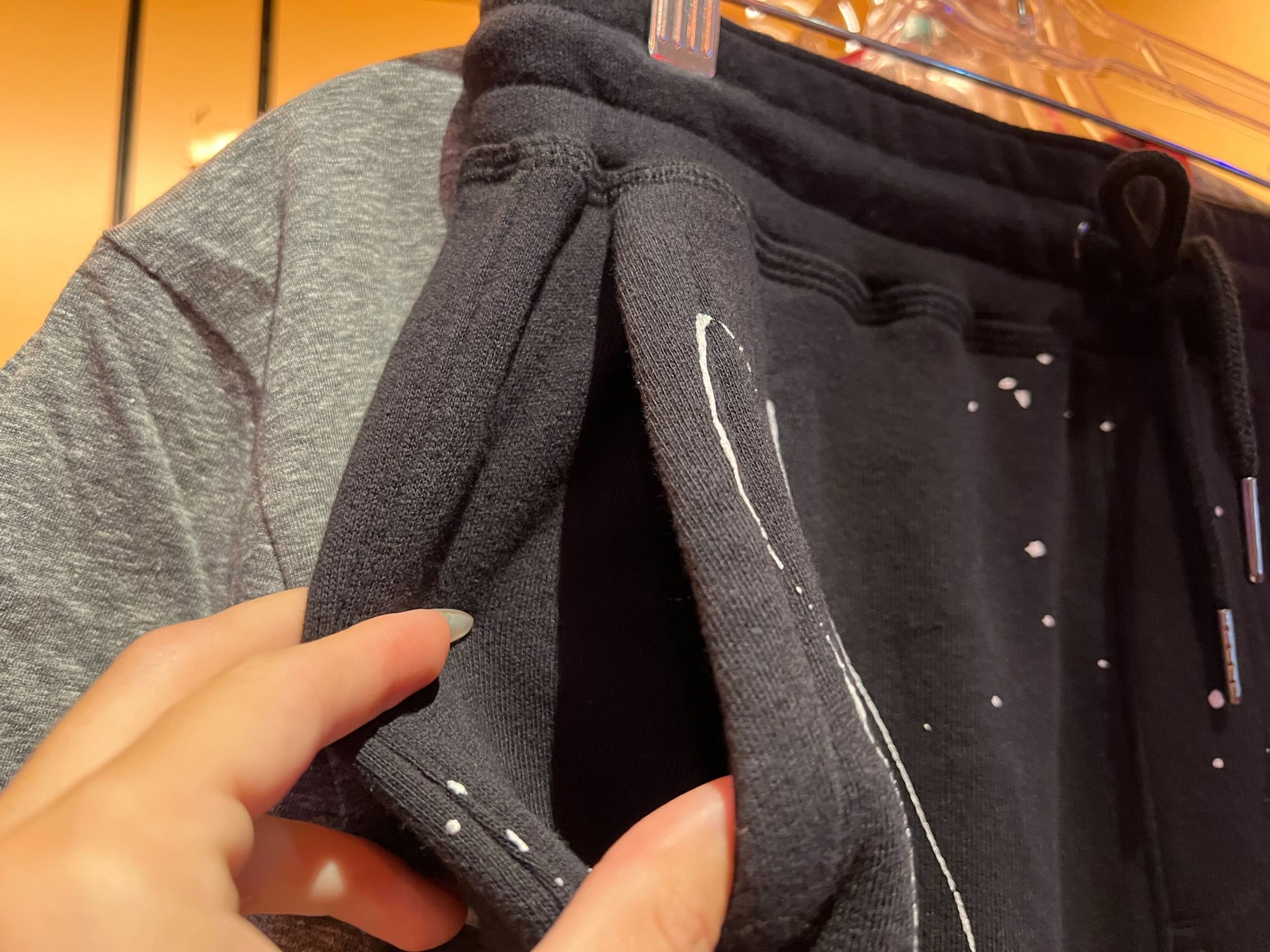 Pizza planet sweatpants joggers pocket detail