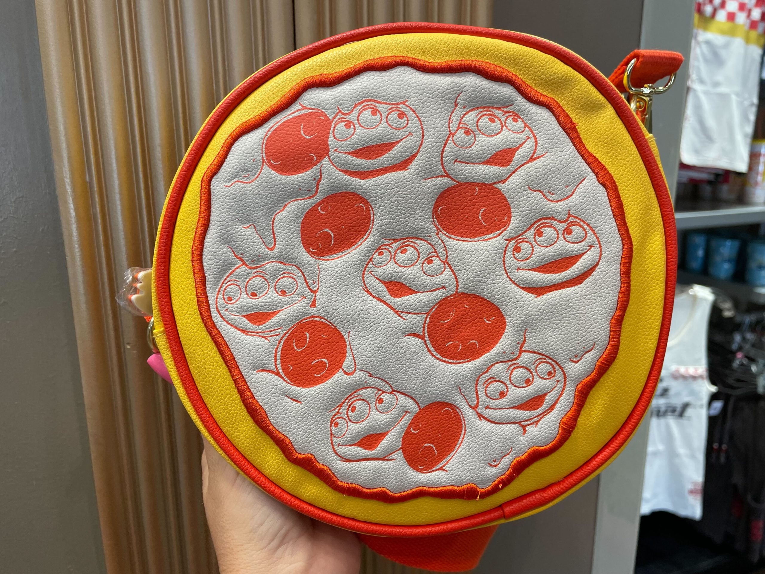 Planet Pizza crossbody close up front