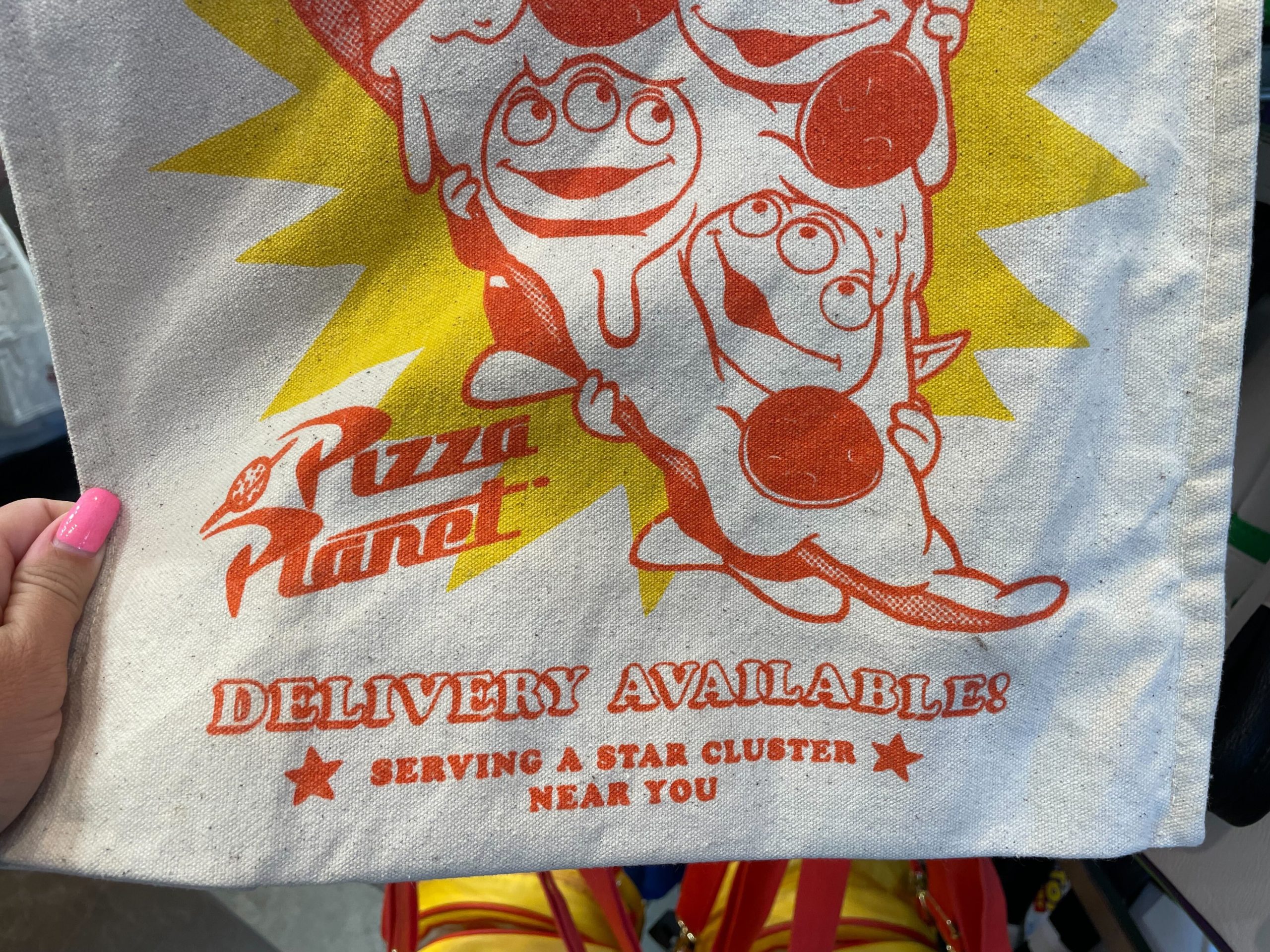 Planet Pizza tote bag close up lower half