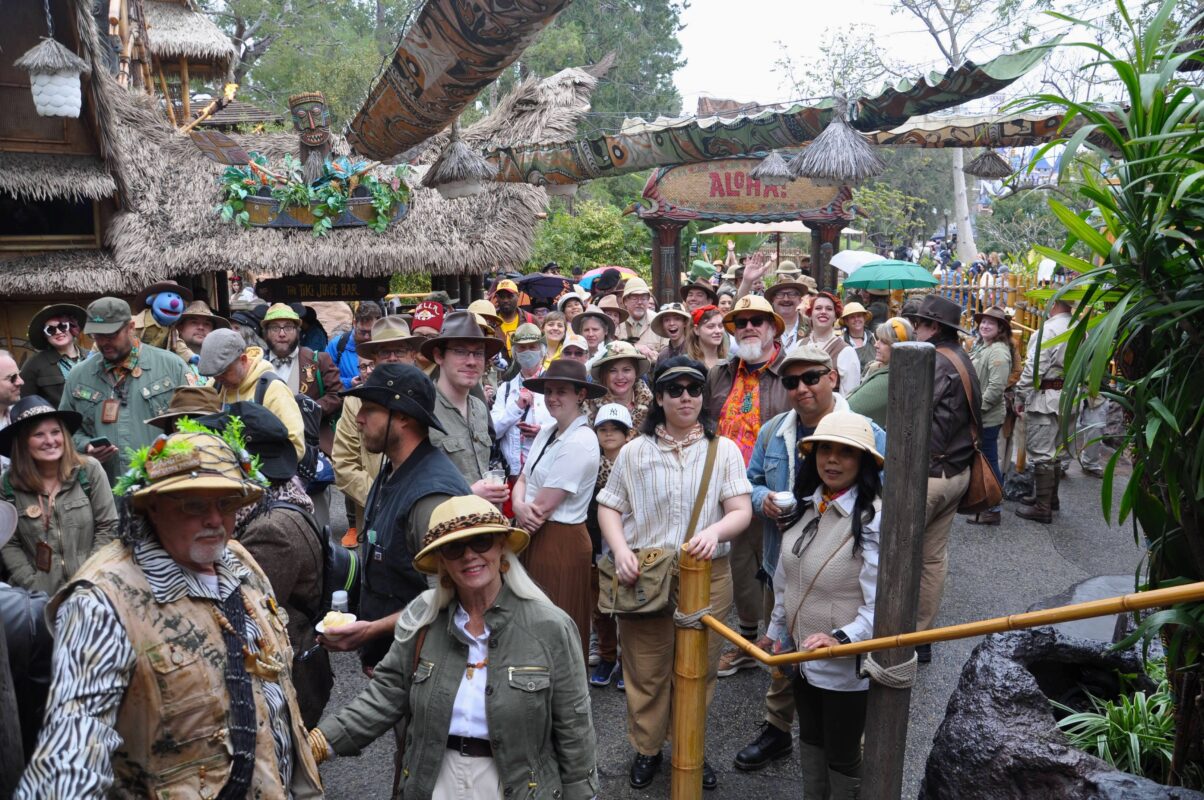 tiki room2023 Guests attending Adventureland Day at Disneyland gather outside the Enchanted Tiki Room.