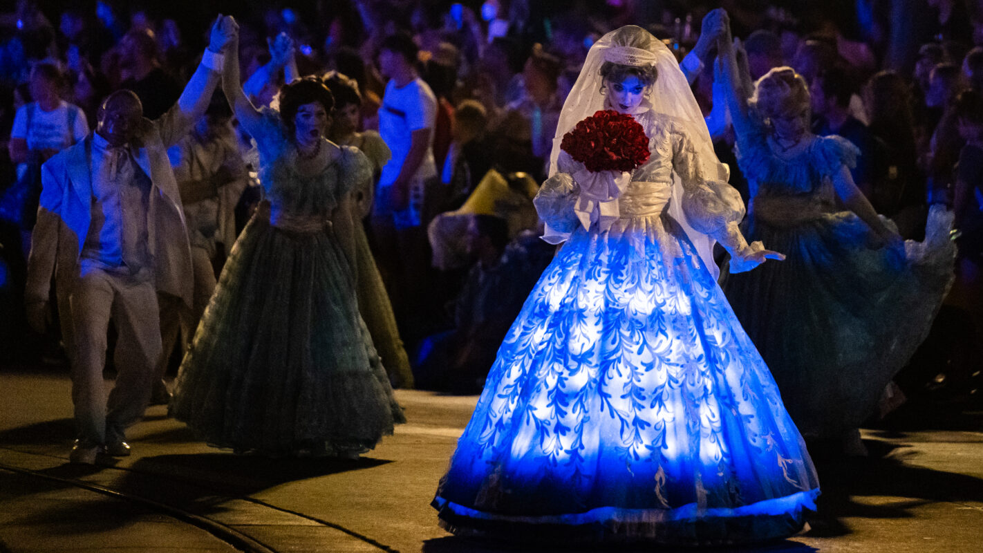 Haunted Mansion Bride with ghostly glowing gown in Boo-To-You Halloween Parade