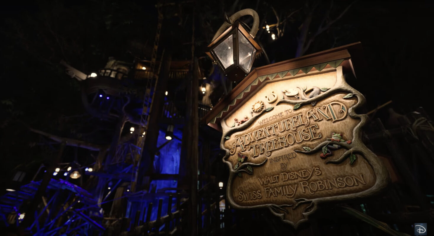 Adventureland Treehouse sign at night