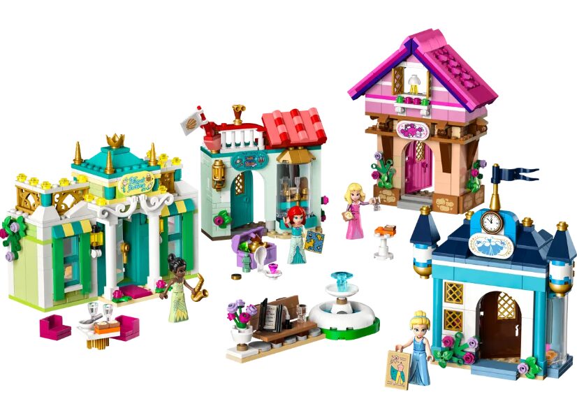 A look at the fully built storefronts in the Disney Princess Market Adventure LEGO set. From left to right are storefronts for Princess Tiana, Ariel, Princess Aurora, and Cinderella.