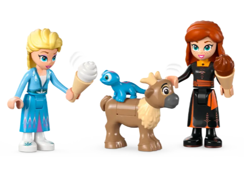 LEGO Disney Anna and Elsa mini dolls hold chocolate and vanilla ice cream cones as they stand next to figures of Bruni the salamander and a baby reindeer.