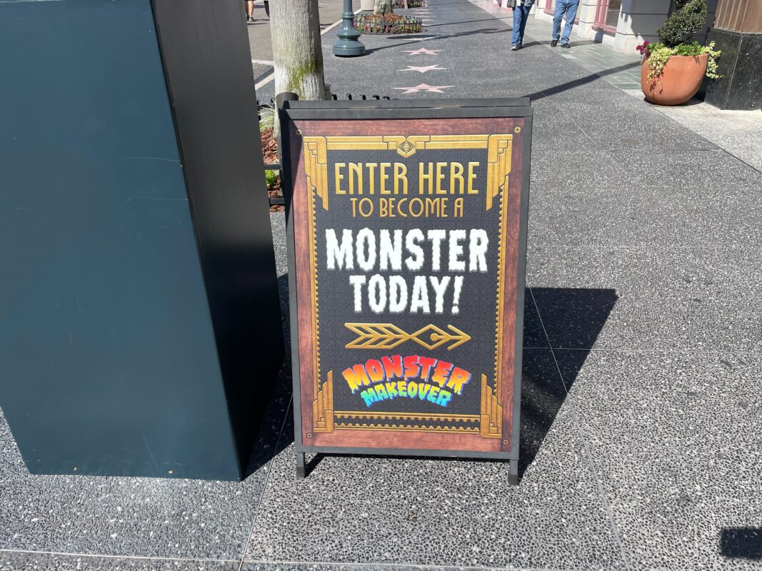 An a-frame sign for the Monster Makeover.