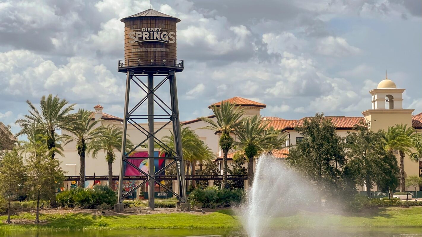 A wide shot of the Disney Springs water tower with fountain in foreground.