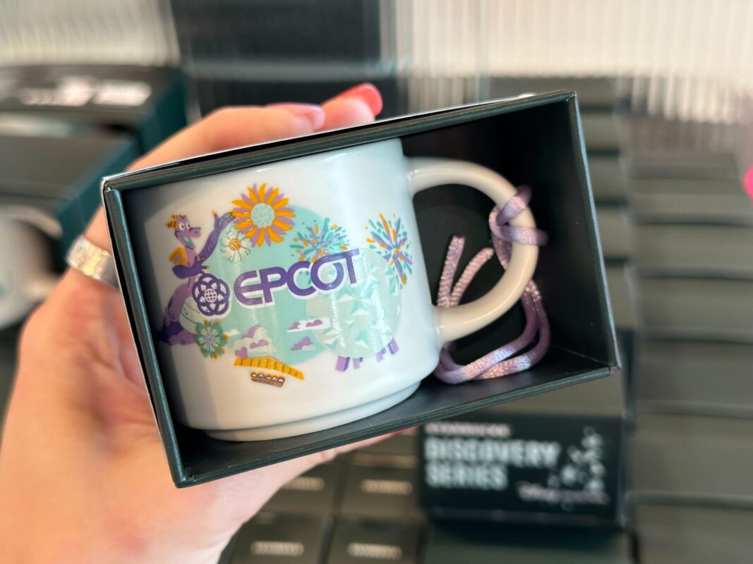 The EPCOT Starbucks espresso mug ornament in its box.