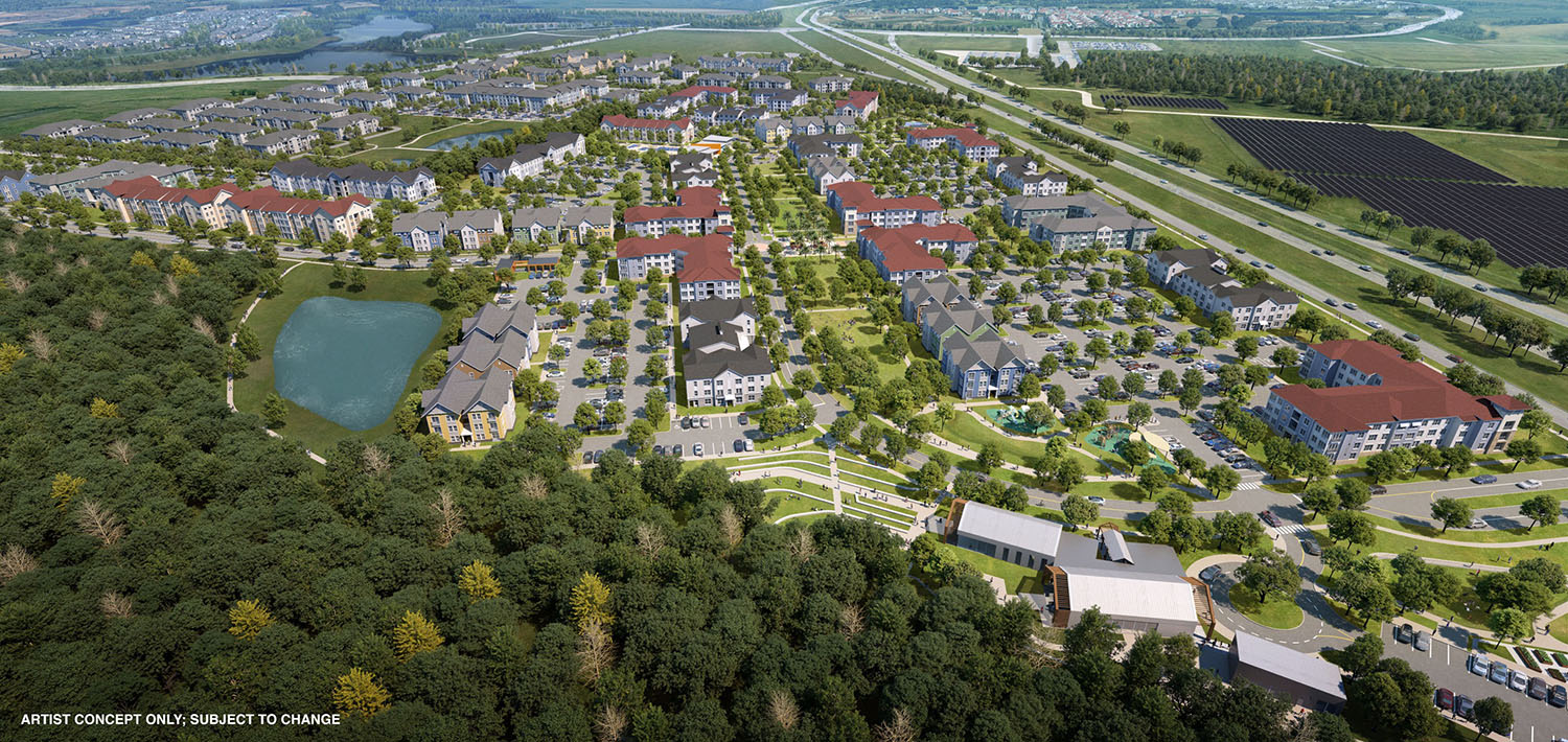 Aerial view of a residential neighborhood surrounded by greenery, featuring houses, affordable housing, apartment buildings, a pond, roads, and nearby highways.