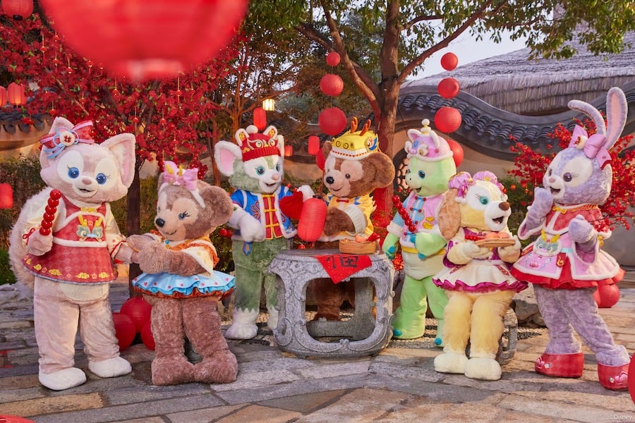 From left to right, LinaBell, ShellieMay, Gelatoni, Duffy, OluMel, CookieAnn, and StellaLou wear their special Chinese New Year outfits.