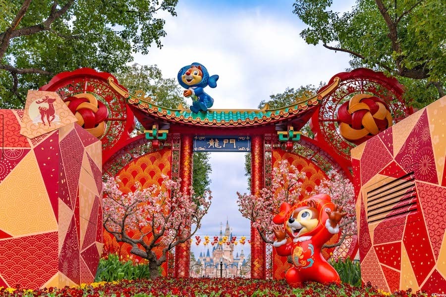 Sculptures of Chip 'n' Dale are dressed as a pair of koi fish at Shanghai Disney Resort.