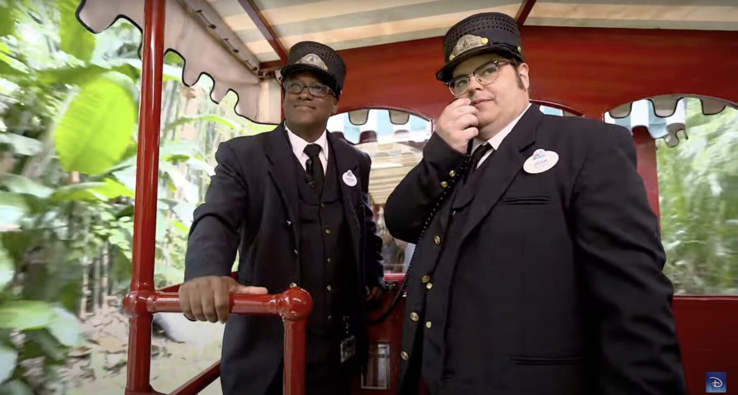 Josh Gad as a Disneyland Railroad conductor with a cast member