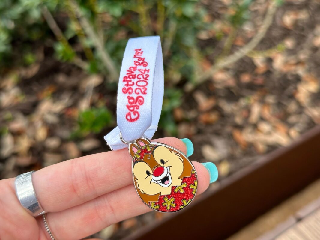 A reporter's hand holds the Dale prize charm for Eggstravaganza 2024.