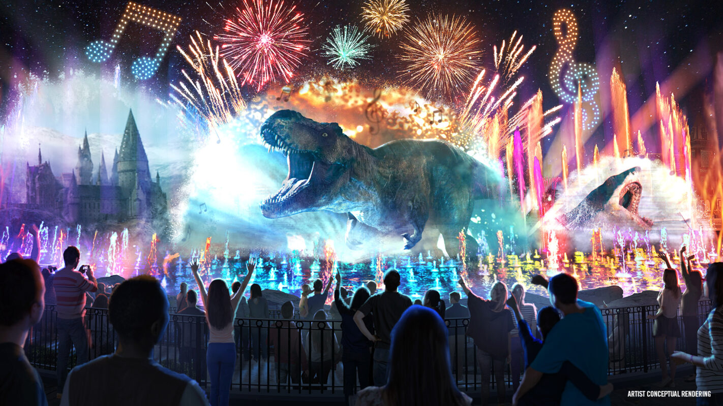 T. Rex, Jaws shark, and Hogwarts amid fireworks, drones, and fountains for CineSational lagoon show
