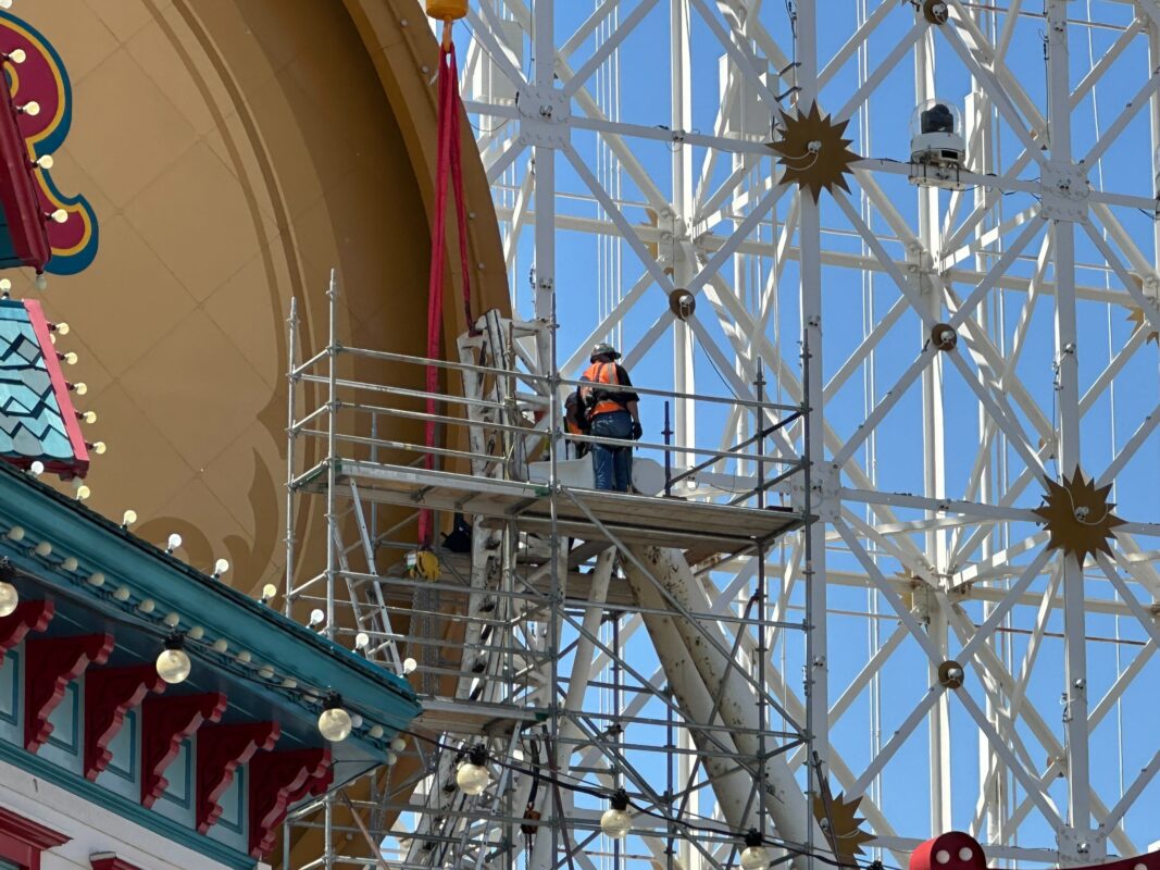 Crew on Incredicoaster scaffolding