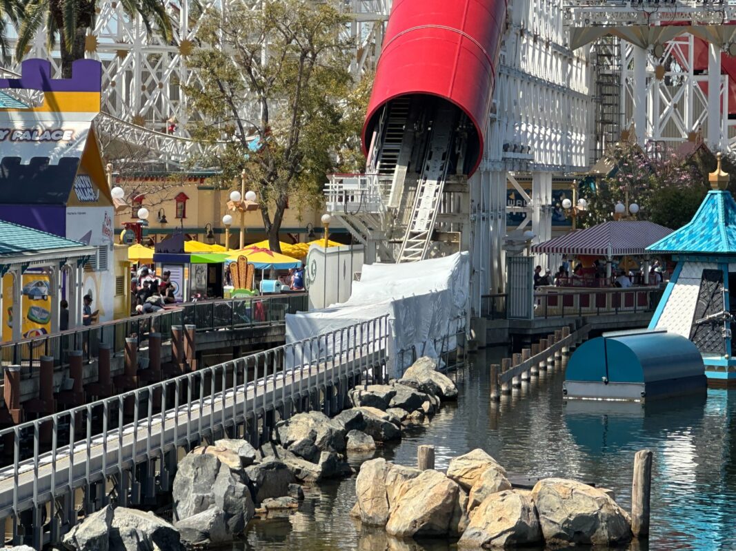 Incredicoaster launch with white tarps