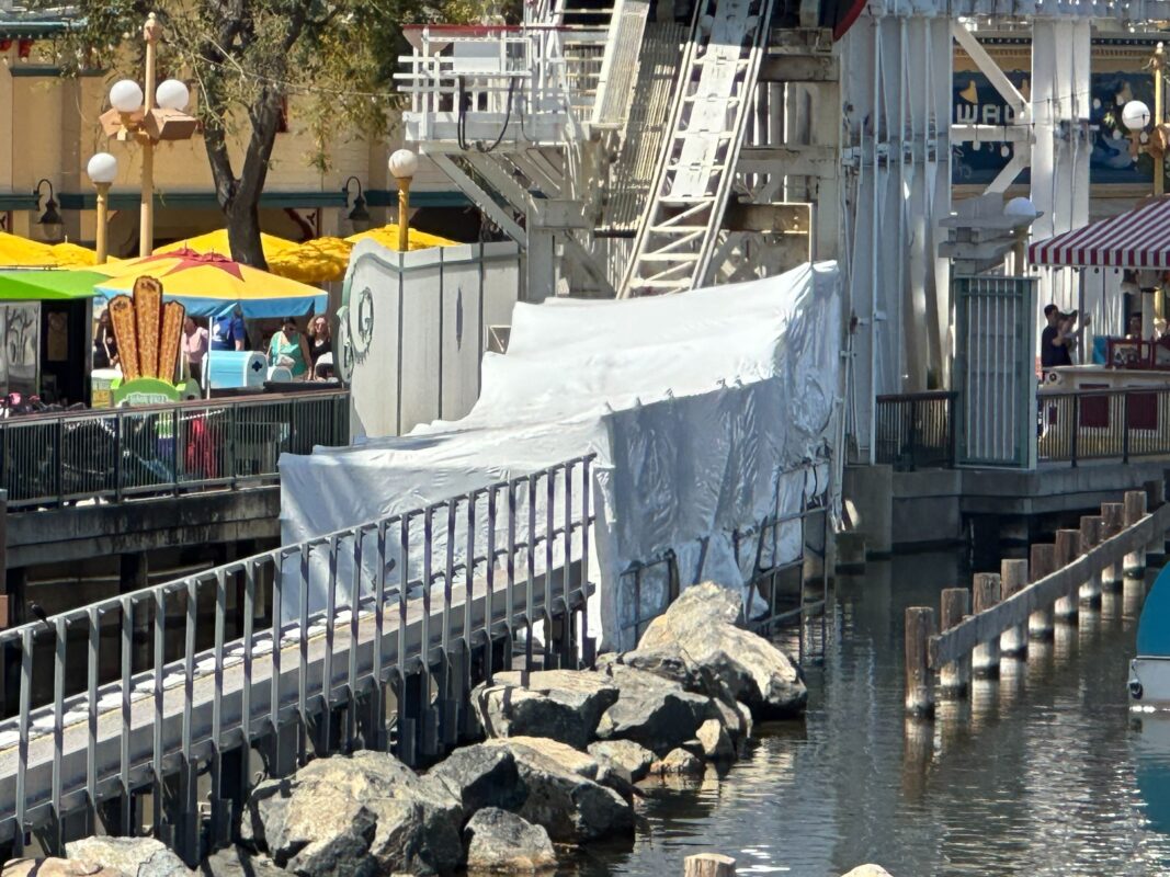 White tarps over Incredicoaster track