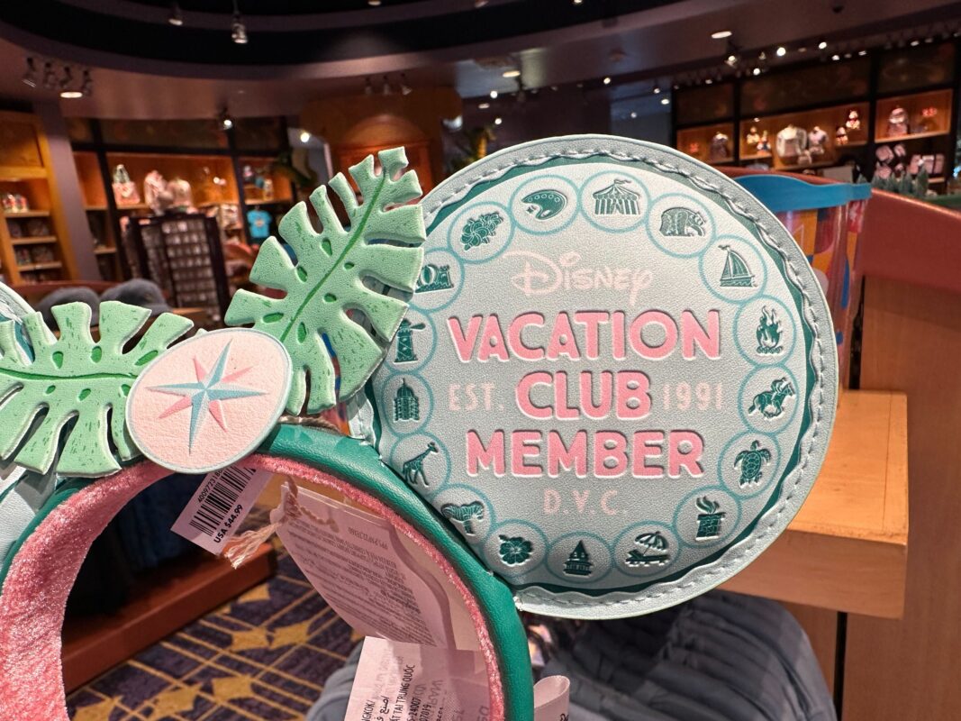 A close-up of the Disney Vacation Club Member art on the left ear.