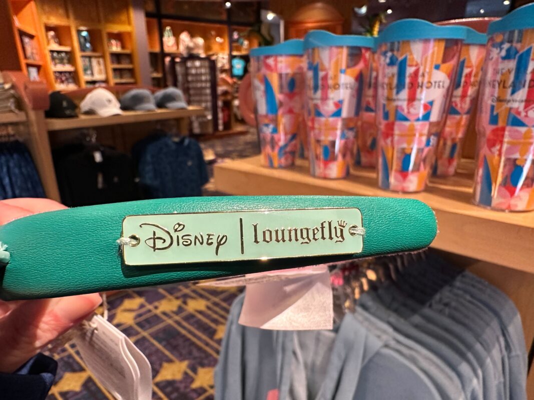 A close-up of the Disney Loungefly enamel badge.