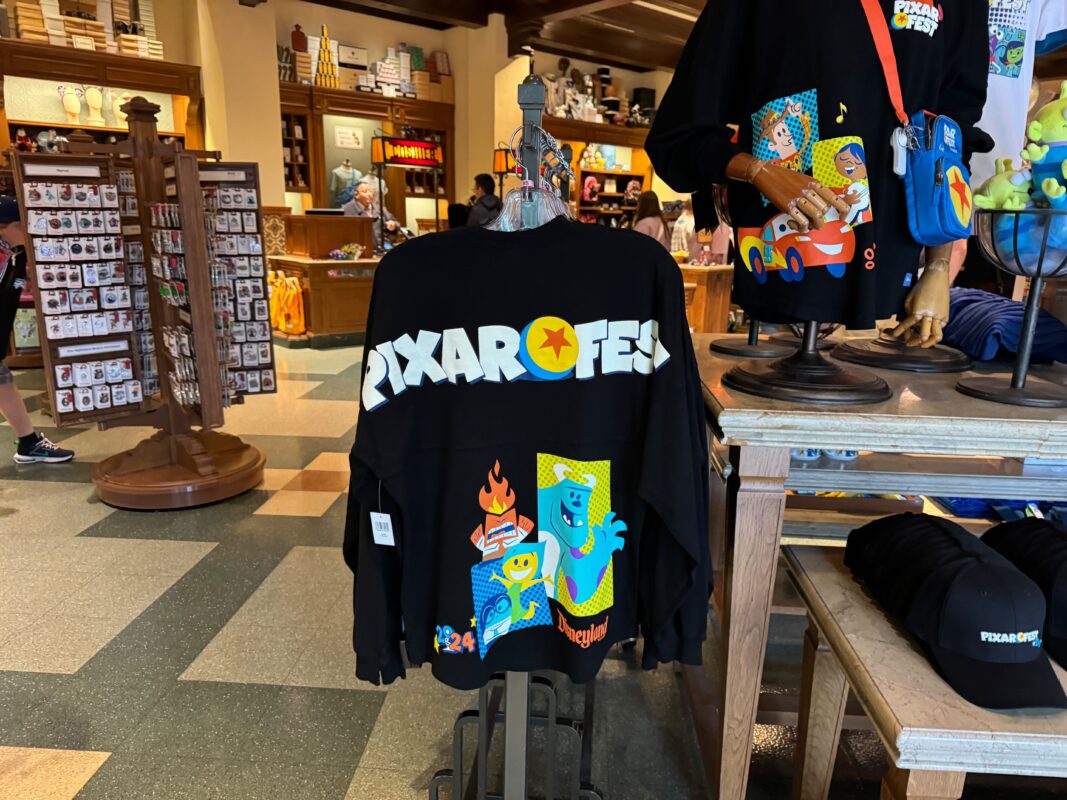 The back of the Pixar Fest Spirit Jersey hanging on a rack.